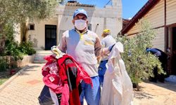 Fethiye'de bahçesi çöplerle dolu evde belediye ekiplerince temizlik yapıldı